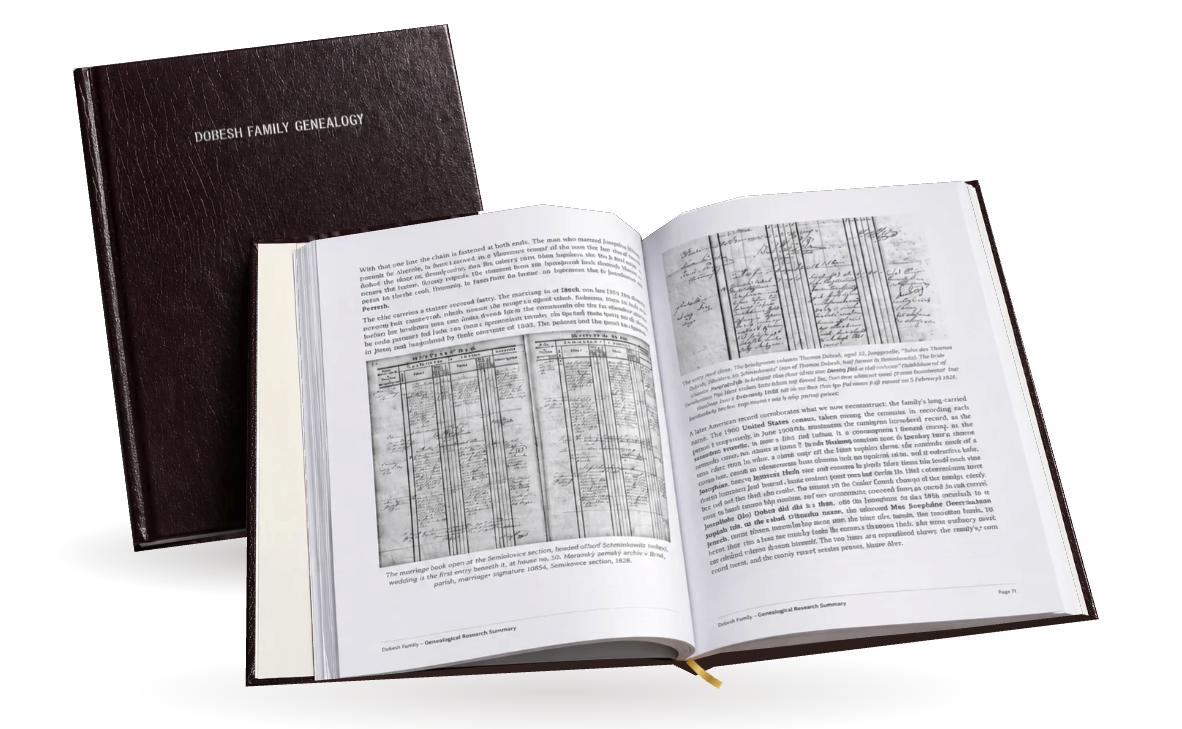The founder’s finished Dobesh family history, a burgundy cover beside an open spread of records